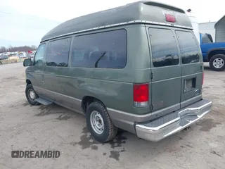 2002 Ford Econoline Passenger XL with VIN 1FMRE11L82HA83636, listed as a IAAI auction lot 41718025 with 153,581 mi miles and . Bid and sale history available at DreamBid. Image 3.