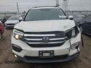 2017 Honda Pilot EX-L z VIN 5FNYF6H61HB022860, wystawiony jako Copart lot #43279875 z przebiegiem 60 219 mil mil oraz Szkoda całkowita • Salvage title. Historia ofert i sprzedaży dostępna na DreamBid. Obrazek 5.