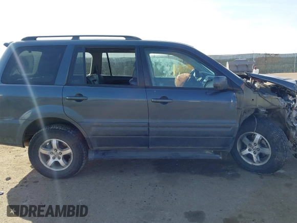 2006 Honda Pilot EX-L with VIN 5FNYF18656B012252, listed as a IAAI auction lot 41801738 with 246,191 mi miles and . Bid and sale history available at DreamBid. Image 14.