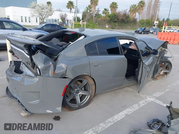 2019 Dodge Charger SRT Hellcat with VIN 2C3CDXL95KH725925, listed as a IAAI auction lot 39012995 with Not Provided miles and . Bid and sale history available at DreamBid. Image 4.
