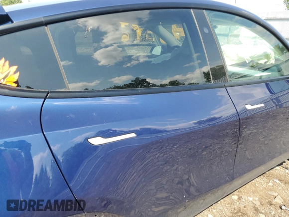 2024 Tesla Model Y Long Range with VIN 7SAYGAEEXRF983702, listed as a Copart auction lot 61536565 with Not provided miles and Salvage title. Bid and sale history available at DreamBid. Image 11.