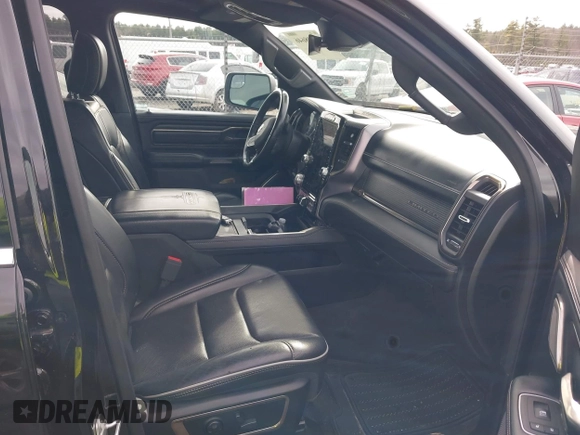 2021 Ram 1500 Limited with VIN 1C6SRFHT7MN664635, listed as a IAAI auction lot 41908646 with 78,013 mi miles and . Bid and sale history available at DreamBid. Image 5.