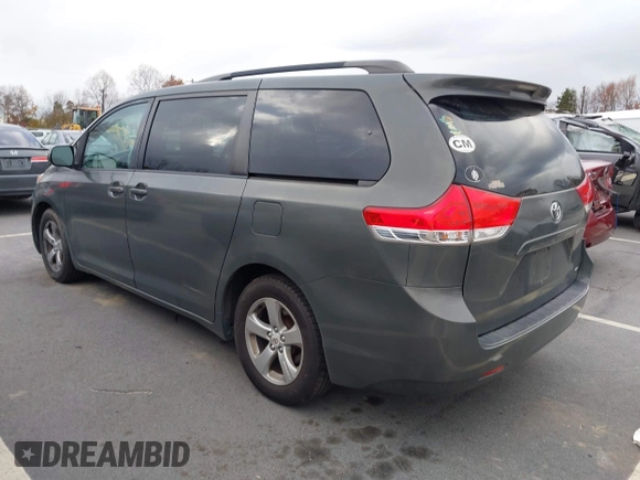 2012 Toyota Sienna LE AAS with VIN 5TDKK3DC5CS253020, listed as a IAAI auction lot 40900034 with 208,421 mi miles. Bid and sale history available at carsss.com. Image 3.