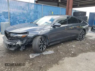 2024 Honda Accord Touring z VIN 1HGCY2F87RA062602, wystawiony jako Copart lot #44787915 z przebiegiem 5 236 mil mil oraz Szkoda całkowita • Salvage title. Historia ofert i sprzedaży dostępna na DreamBid. Obrazek 1.