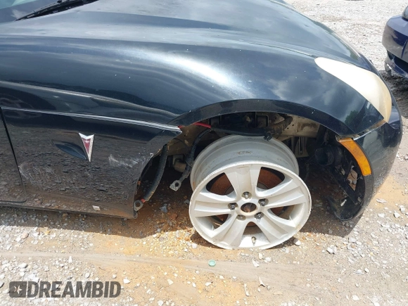 2007 Pontiac Solstice GXP z VIN 1G2MG35X17Y125299, wystawiony jako IAAI lot #42168624 z przebiegiem 123 526 mil mil oraz . Historia ofert i sprzedaży dostępna na DreamBid. Obrazek 6.