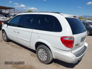 2005 Chrysler Town & Country LX with VIN 2C4GP44R75R213048, listed as a IAAI auction lot 42068985 with 100,688 mi miles and . Bid and sale history available at DreamBid. Image 3.