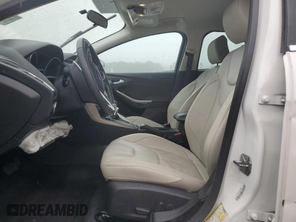 2016 Ford Focus Titanium with VIN 1FADP3N2XGL321275, listed as a Copart auction lot 61282845 with 111,519 mi miles and Salvage title. Bid and sale history available at DreamBid. Image 7.