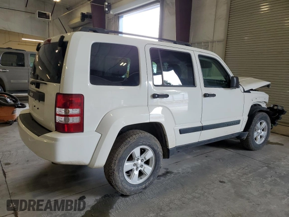 2010 Jeep Liberty Sport with VIN 1J4PN2GK2AW115064, listed as a Copart auction lot 57344645 with 114,275 mi miles and Salvage title. Bid and sale history available at DreamBid. Image 3.