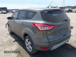 2013 Ford Escape SE with VIN 1FMCU0G93DUA21926, listed as a IAAI auction lot 41901699 with 174,456 mi miles and . Bid and sale history available at DreamBid. Image 3.