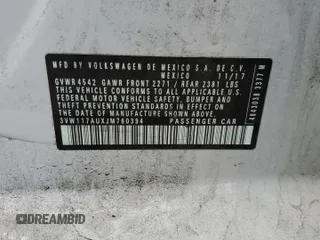 2018 Volkswagen Golf S z VIN 3VW117AUXJM760394, wystawiony jako Copart lot #82150494 z przebiegiem 113 381 mil mil oraz Szkoda całkowita • Salvage title. Historia ofert i sprzedaży dostępna na DreamBid. Obrazek 12.