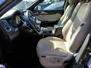 2017 Mazda CX-9 Grand Touring z VIN JM3TCADY8H0138866, wystawiony jako Copart lot #80894184 z przebiegiem Nie podano mil oraz Szkoda całkowita • Salvage title. Historia ofert i sprzedaży dostępna na DreamBid. Obrazek 7.