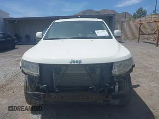 2011 Jeep Grand Cherokee Laredo z VIN 1J4RR4GG7BC555983, wystawiony jako IAAI lot #42361563 z przebiegiem 50 153 mil mil oraz . Historia ofert i sprzedaży dostępna na DreamBid. Obrazek 6.