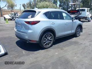 2018 Mazda CX-5 Grand Touring with VIN JM3KFBDM3J0343782, listed as a IAAI auction lot 42527044 with 60,180 mi miles and . Bid and sale history available at DreamBid. Image 4.
