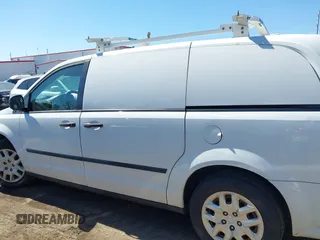 2015 Ram Cargo Van Tradesman with VIN 2C4JRGAG4FR564358, listed as a IAAI auction lot 41817594 with 213,975 mi miles. Bid and sale history available at carsss.com. Image 14.