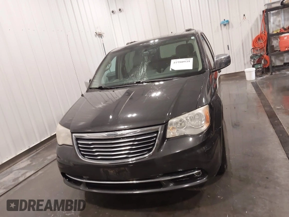 2011 Chrysler Town & Country Touring L with VIN 2A4RR8DG3BR676240, listed as a IAAI auction lot 41980939 with 184,524 mi miles and . Bid and sale history available at DreamBid. Image 12.