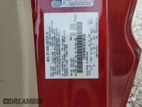 2008 Ford Mustang Deluxe with VIN 1ZVHT84N185158146, listed as a Copart auction lot 56237985 with 105,968 mi miles and Salvage title. Bid and sale history available at DreamBid. Image 12.