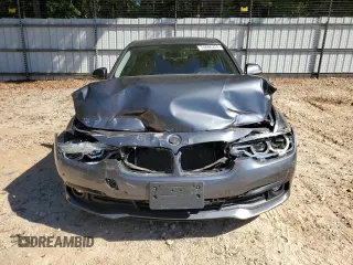 2018 BMW 3 Series 320i xDrive with VIN WBA8A3C54JA358624, listed as a Copart auction lot 74696374 with 55,342 mi miles and Salvage title. Bid and sale history available at DreamBid. Image 5.