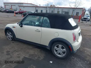 2006 MINI Convertible with VIN WMWRF33566TF65410, listed as a IAAI auction lot 40813052 with 131,109 mi miles and . Bid and sale history available at DreamBid. Image 3.