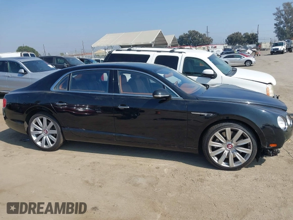 2015 Bentley Flying Spur V8 with VIN SCBET9ZA3FC042007, listed as a IAAI auction lot 40551620 with 27,039 mi miles and . Bid and sale history available at DreamBid. Image 14.