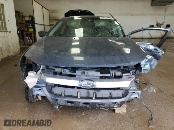 2012 Ford Fusion SEL with VIN 3FAHP0JA1CR270077, listed as a Copart auction lot 69078734 with 154,263 mi miles and Clean Title. Bid and sale history available at DreamBid. Image 5.