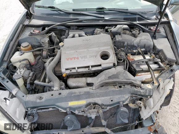2003 Toyota Camry LE z VIN 4T1BF32K13U554339, wystawiony jako Copart lot #55972595 z przebiegiem 69 549 mil mil oraz Szkoda całkowita • Salvage title. Historia ofert i sprzedaży dostępna na DreamBid. Obrazek 11.