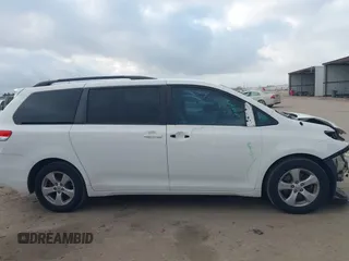 2014 Toyota Sienna LE AAS with VIN 5TDKK3DC6ES526159, listed as a IAAI auction lot 41522210 with 123,563 mi miles and . Bid and sale history available at DreamBid. Image 14.