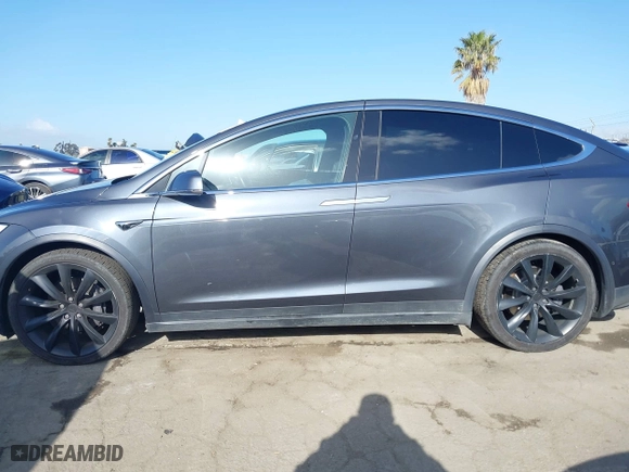2018 Tesla Model X 75D with VIN 5YJXCBE22JF124270, listed as a IAAI auction lot 41909734 with 92,553 mi miles. Bid and sale history available at carsss.com. Image 14.