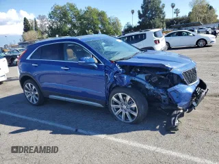 2023 Cadillac XT4 AWD Premium Luxury z VIN 1GYFZDR44PF206176, wystawiony jako Copart lot #46456445 z przebiegiem 3 896 mil mil oraz Szkoda całkowita • Salvage title. Historia ofert i sprzedaży dostępna na DreamBid. Obrazek 4.