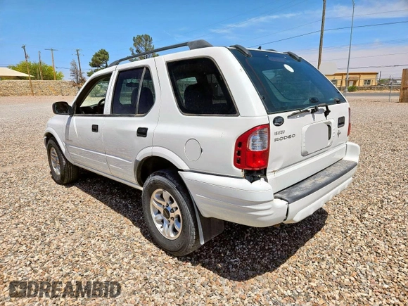 2004 Isuzu Rodeo S z VIN 4S2CK58W544313903, wystawiony jako Copart lot #57535585 z przebiegiem 121 385 mil mil oraz Tytuł czysty. Historia ofert i sprzedaży dostępna na DreamBid. Obrazek 3.