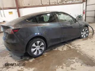 2024 Tesla Model Y Long Range with VIN 7SAYGDEE0RA282634, listed as a IAAI auction lot 41627510 with 23,054 mi miles and . Bid and sale history available at DreamBid. Image 4.