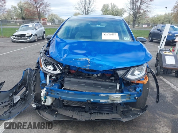 2021 Chevrolet Bolt EV LT z VIN 1G1FY6S08M4112443, wystawiony jako IAAI lot #42045018 z przebiegiem 38 920 mil mil oraz . Historia ofert i sprzedaży dostępna na DreamBid. Obrazek 12.