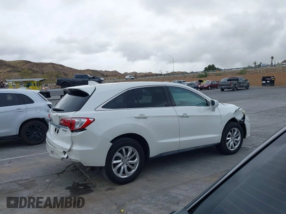 2018 Acura RDX with VIN 5J8TB3H31JL012439, listed as a IAAI auction lot 41565530 with 63,909 mi miles and . Bid and sale history available at DreamBid. Image 13.