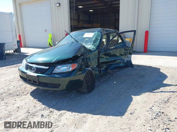 2001 Mazda Protege LX with VIN JM1BJ225310404647, listed as a IAAI auction lot 41480466 with 115,606 mi miles and . Bid and sale history available at carsss.com. Image 17.