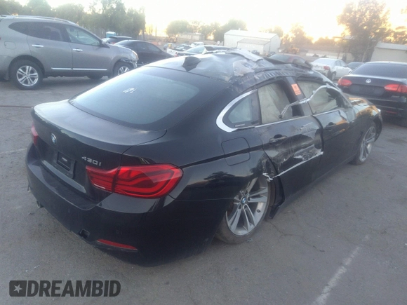 2019 BMW 4 Series 430i with VIN WBA4J1C50KBM17277, listed as a IAAI auction lot 31559329 with 1 mi miles. Bid and sale history available at carsss.com. Image 4.