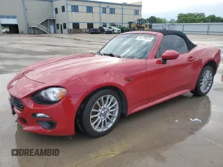 2017 FIAT 124 Spider Lusso z VIN JC1NFAEKXH0102435, wystawiony jako Copart lot #54235675 z przebiegiem 84 343 mil mil oraz Szkoda całkowita • Salvage title. Historia ofert i sprzedaży dostępna na DreamBid. Obrazek 1.