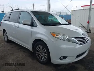 2015 Toyota Sienna XLE with VIN 5TDYK3DC5FS640102, listed as a IAAI auction lot 41885194 with 119,972 mi miles. Bid and sale history available at carsss.com. Image 1.