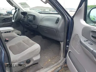 2003 Ford F-150 XLT with VIN 1FTRW08L63KD55851, listed as a IAAI auction lot 42359388 with Not provided miles and . Bid and sale history available at DreamBid. Image 5.