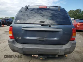 2004 Jeep Grand Cherokee Laredo with VIN 1J4GX48S24C216941, listed as a Copart auction lot 55584785 with 279,710 mi miles and Salvage title. Bid and sale history available at DreamBid. Image 6.