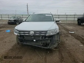 2018 Volkswagen Tiguan SEL z VIN 3VV3B7AX2JM001338, wystawiony jako Copart lot #51742105 z przebiegiem 71 555 mil mil oraz Szkoda całkowita • Salvage title. Historia ofert i sprzedaży dostępna na DreamBid. Obrazek 12.