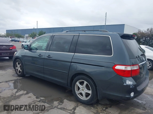 2005 Honda Odyssey TOURING with VIN 5FNRL38895B061480, listed as a IAAI auction lot 41807150 with 190,261 mi miles. Bid and sale history available at carsss.com. Image 3.