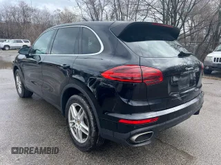 2016 Porsche Cayenne with VIN WP1AA2A26GKA13040, listed as a Copart auction lot 52623935 with 87,594 mi miles and Clean Title. Bid and sale history available at carsss.com. Image 4.