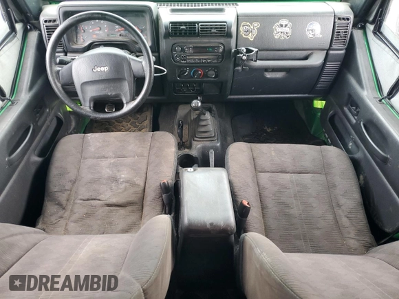 2004 Jeep Wrangler SE with VIN 1J4FA29124P769475, listed as a Copart auction lot 64371244 with 136,877 mi miles and Salvage title. Bid and sale history available at DreamBid. Image 8.