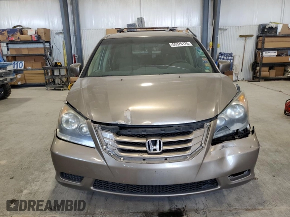 2009 Honda Odyssey EX с VIN 5FNRL38479B019599, выставлен на аукционе Copart как лот 56375175 с пробегом 241 526 миль миль и Списание • Salvage title. История ставок и продаж доступна на DreamBid. Изображение 5.