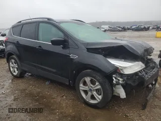 2015 Ford Escape SE with VIN 1FMCU9GX7FUC44640, listed as a Copart auction lot 77141033 with 148,967 mi miles and Salvage Title. Bid and sale history available at DreamBid. Image 4.