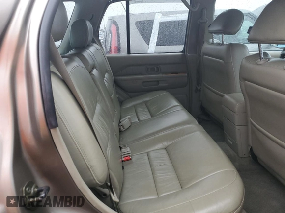 2001 Infiniti QX4 Luxury z VIN JNRDR07X81W103465, wystawiony jako Copart lot #73761114 z przebiegiem 160 676 mil mil oraz Szkody całkowita. Historia ofert i sprzedaży dostępna na DreamBid. Obrazek 11.