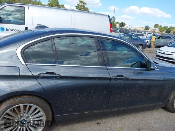 2013 BMW 3 Series 328i xDrive with VIN WBA3B3G56DNR81144, listed as a IAAI auction lot 40620694 with 159,022 mi miles. Bid and sale history available at carsss.com. Image 13.