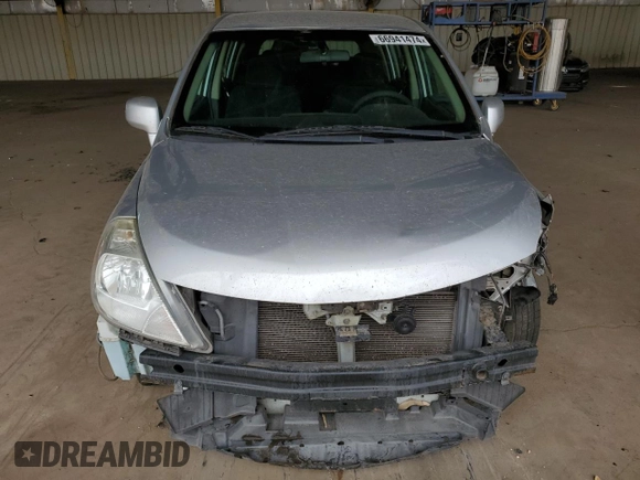 2010 Nissan Versa 1.8 SL with VIN 3N1BC1CP7AL405424, listed as a Copart auction lot 66941474 with 143,410 mi miles and Salvage Title. Bid and sale history available at carsss.com. Image 5.