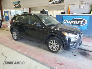2016 Mazda CX-5 Sport with VIN JM3KE4BY1G0870166, listed as a Copart auction lot 60433035 with 93,433 mi miles and Salvage title. Bid and sale history available at DreamBid. Image 4.