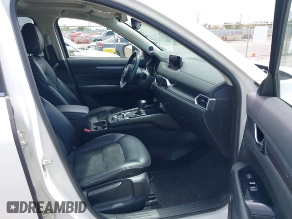 2018 Mazda CX-5 Touring with VIN JM3KFACM3J0381122, listed as a IAAI auction lot 42023838 with 76,121 mi miles. Bid and sale history available at carsss.com. Image 5.
