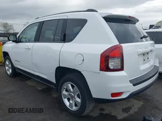 2014 Jeep Compass Altitude with VIN 1C4NJCBA8ED606589, listed as a IAAI auction lot 41939914 with 148,281 mi miles. Bid and sale history available at carsss.com. Image 3.
